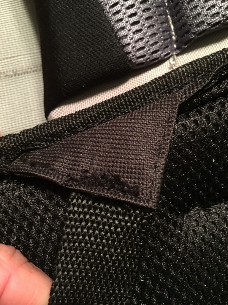 I ripped out these stitches and removed the old webbing. Picked up some replacement webbing at REI for a few bucks - its better quality and won't slip trough the buckle